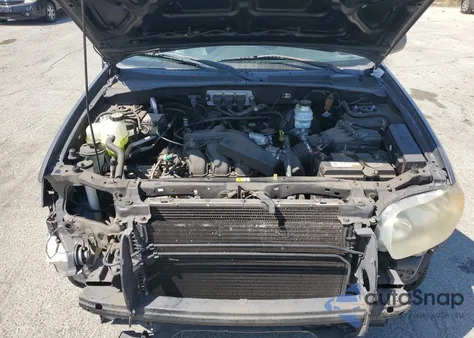 2006 Ford Escape Limited z USA, uszkodzony, nr VIN 1FMCU94106KB11424